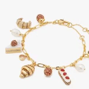 Kate Spade Gold Charm Bracelet with Red and White Accents